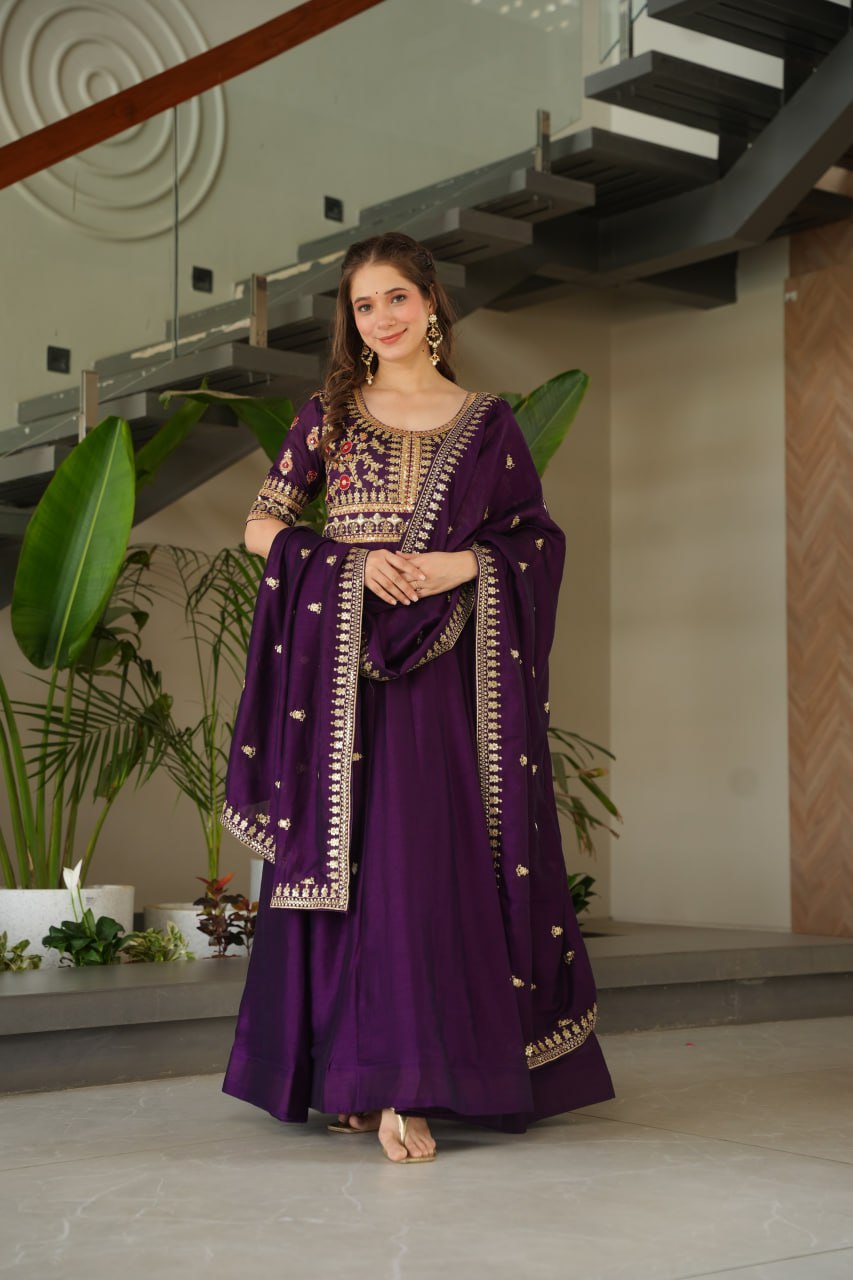 Aadishri Purple Vichitra Silk Gown with multi-sequins and zari embroidery – perfect Indian ethnic wear for weddings, party wear dresses for women, designer gown for women, traditional Indian dress, Indian clothing for women, ethnic wear for girls, gown for wedding function, Indian dress online shopping, full sleeve gown for women, festive wear for ladies.
