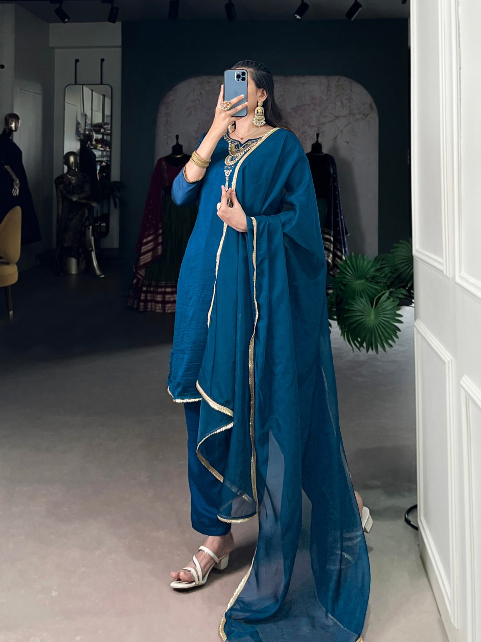 Teal blue Vichitra silk suit set featuring delicate handwork with beads and sequins, paired with an elegant organza dupatta – perfect for festive events and party wear.