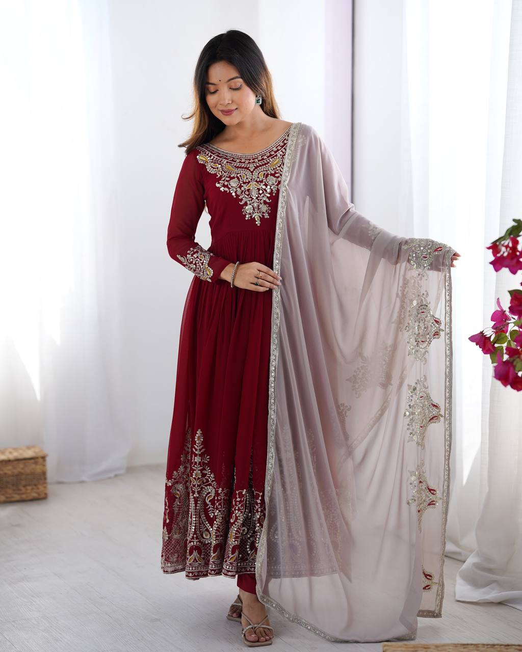 Tejvini Maroon Embroidered Gown Set – heavy georgette gown with multi-thread 5mm sequin embroidery, full sleeves, soft micro cotton lining, paired with matching maroon embroidered dupatta and stitched cotton bottom – ideal for weddings, festive events, and reception looks.