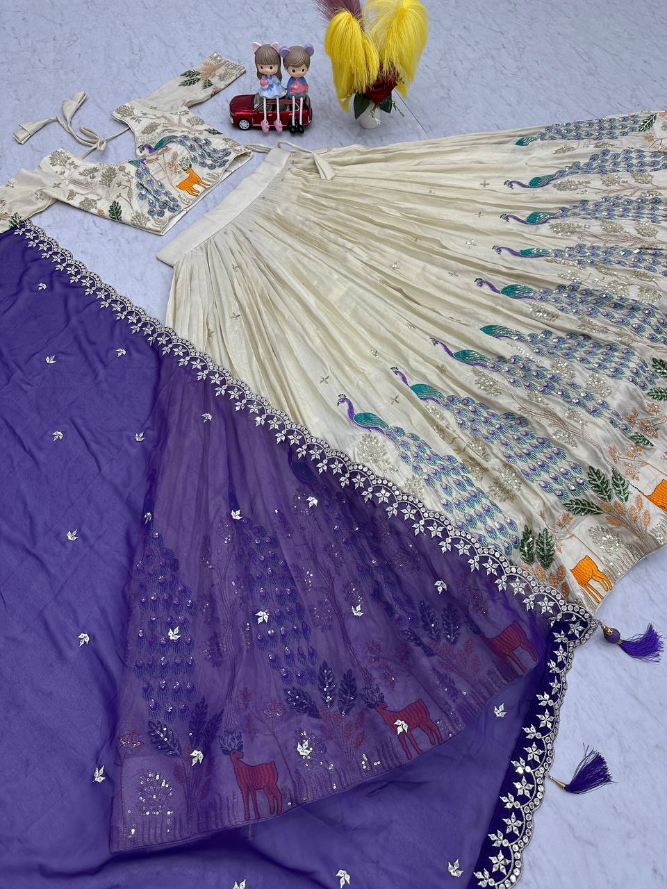 Tarini purple tissue silk embroidered lehenga choli