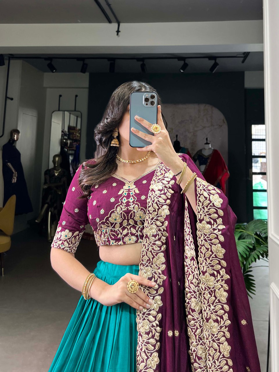 Teal Tussar silk lehenga with foil print and embroidered dupatta