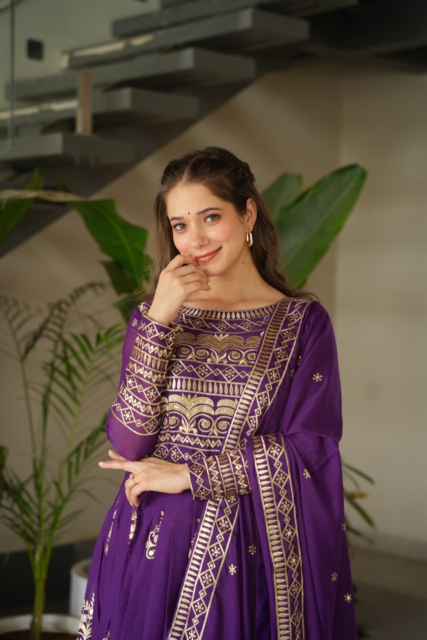 Purple Chinnon gown set with multi-colored sequins and beads embroidery, full sleeves, and matching embroidered dupatta – ideal for festive and wedding occasions