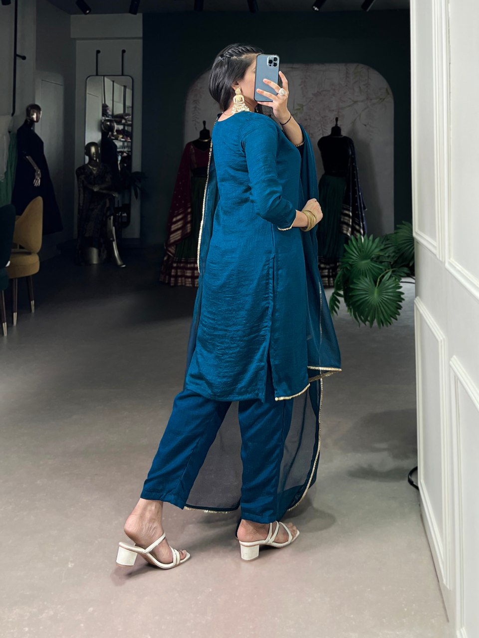 Teal blue Vichitra silk suit set featuring delicate handwork with beads and sequins, paired with an elegant organza dupatta – perfect for festive events and party wear.