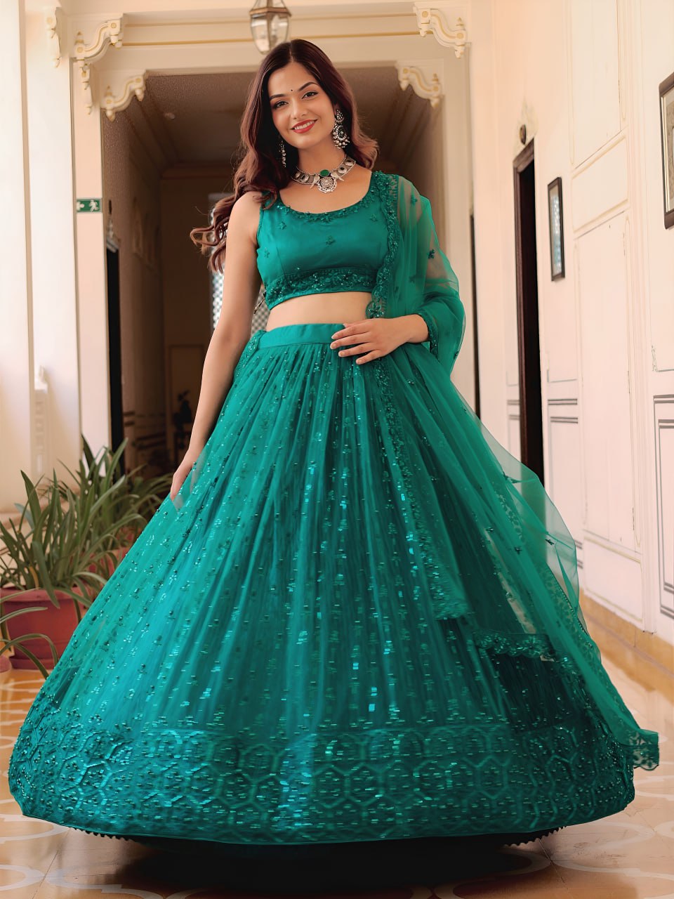 Teal green soft net thread sequins pearl embroidery lehenga choli