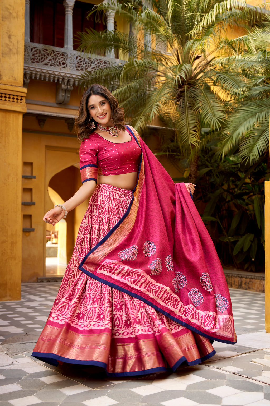 Girija Pink Color Dola Silk Batik Print With Zari
Weaving Work Lehenga Choli
