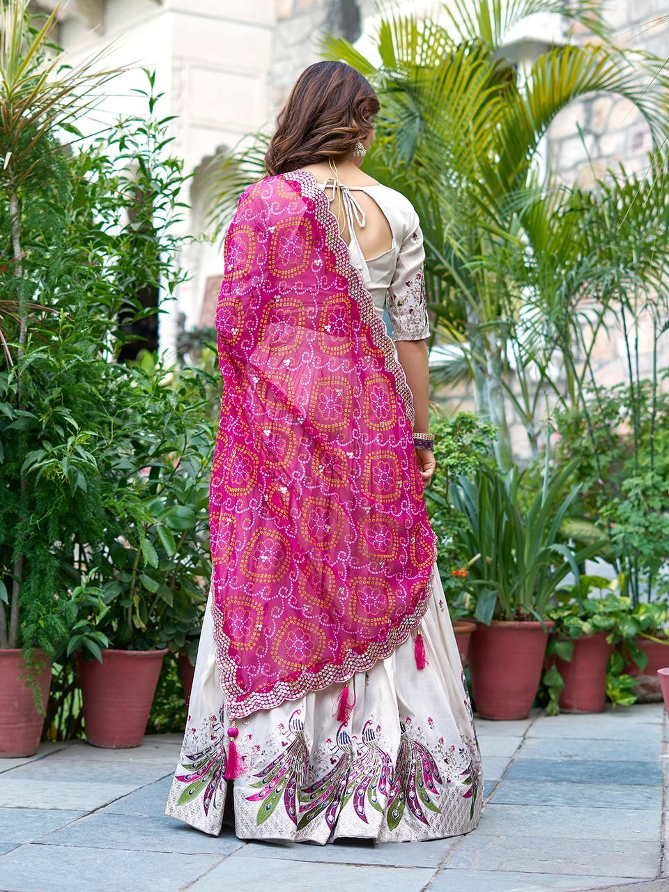 Amla Off-White Tissue Silk Sequins Thread Work Lehenga Choli with Pink Bandhej Dupatta