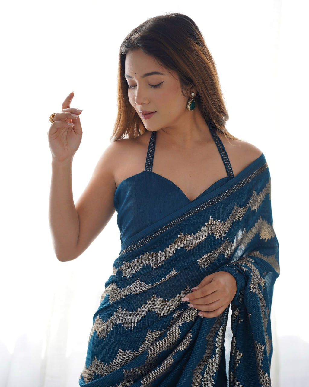 Elegant Aira Blue Georgette saree featuring heavy sequin embroidery and Seroski diamond work, paired with an unstitched satin Banglori blouse – perfect as a wedding saree, party wear saree, festive wear outfit, designer ethnic saree, and a must-have for lovers of premium georgette sarees.