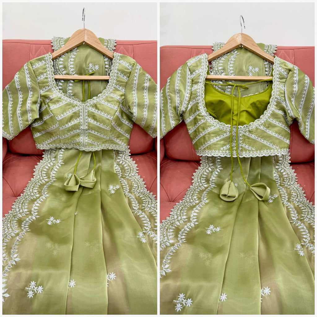 Vikatya pista green Jimmy Choo fabric saree with sequin-thread embroidery & unstitched blouse—perfect for weddings, festivals & party wear.