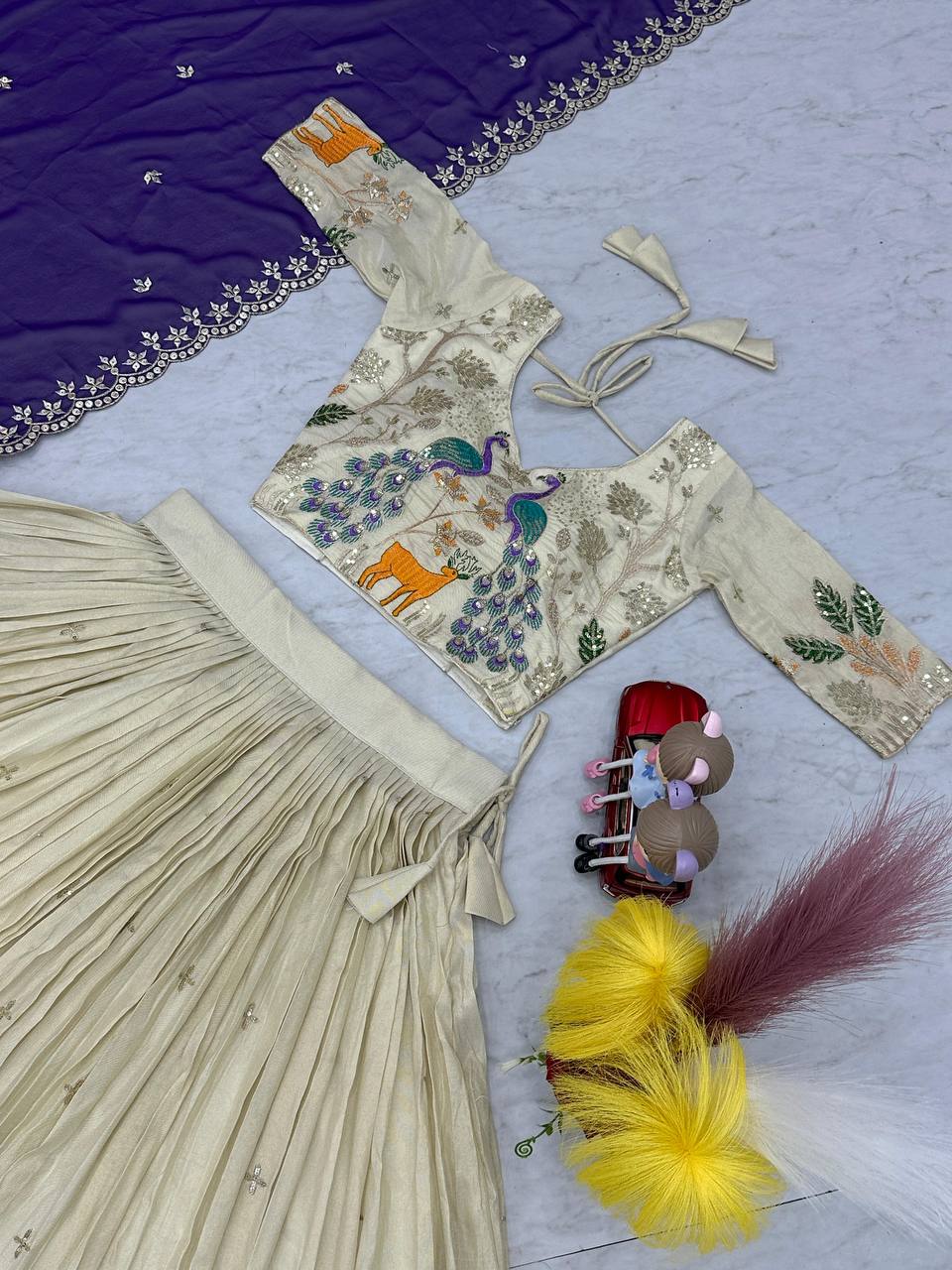 Tarini purple tissue silk embroidered lehenga choli