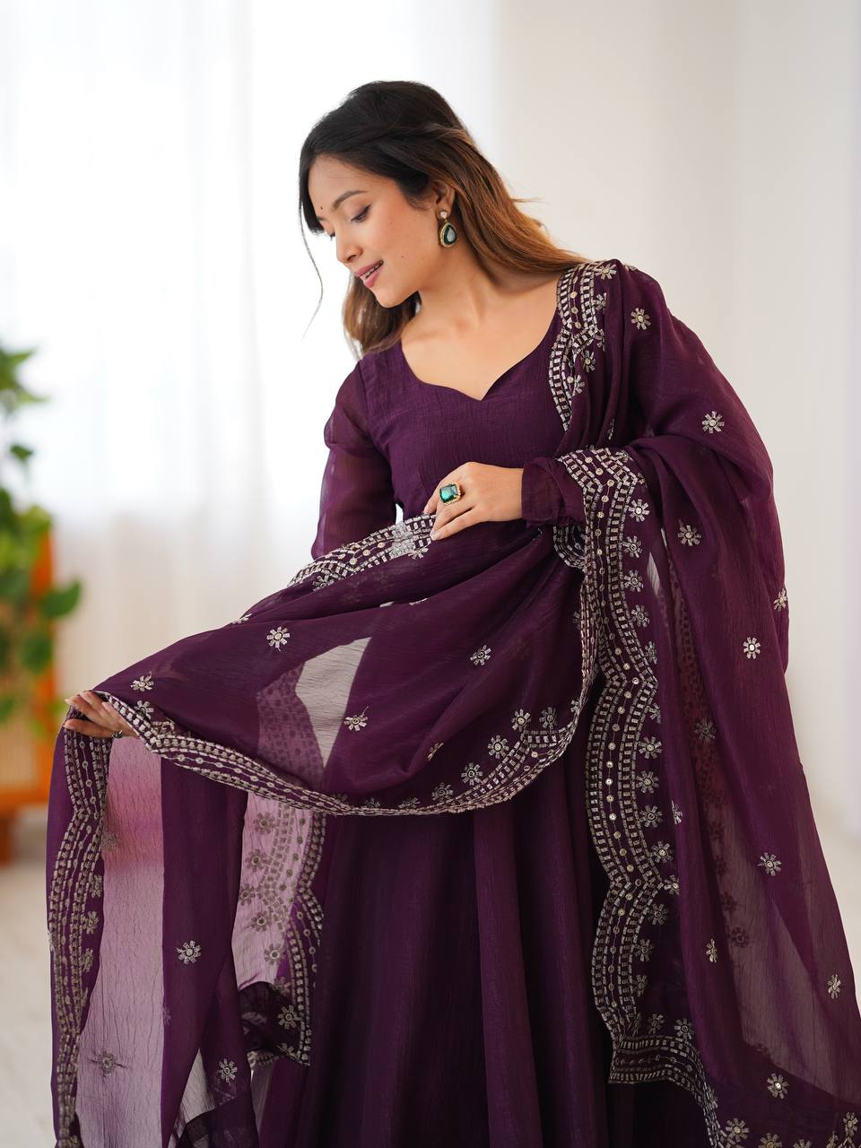 Tiya purple Fandy Silk Anarkali suit with 4.5-meter flair, full sleeves & embroidered dupatta – stitched & ready for weddings, parties & festive wear.