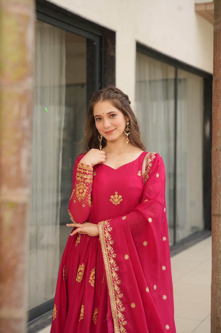 Rudrika Pink Embroidered Gown in soft Star Georgette with intricate zari and sequin work, full-length 56-inch flare gown with matching embroidered dupatta, elegant pan neck design, perfect for weddings and festive occasions