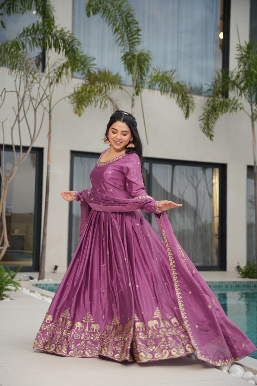 Harvisha mauve purple Chinon silk embroidered gown with full sleeves, floor-length 56-inch flair, rich sequin detailing, and matching embroidered dupatta – ideal Indian ethnic party gown for weddings, receptions, and festive occasions.