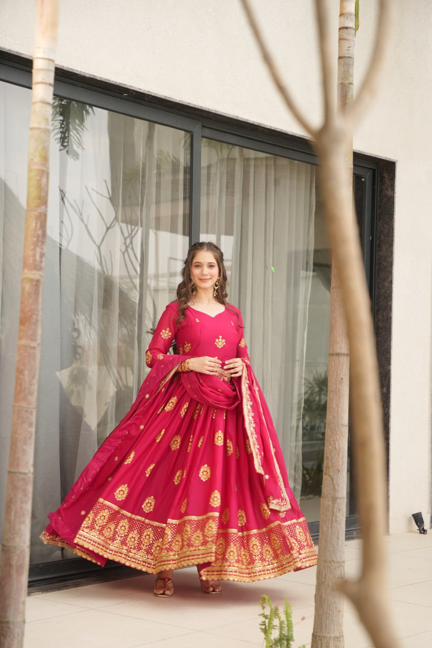 Rudrika Pink Embroidered Gown in soft Star Georgette with intricate zari and sequin work, full-length 56-inch flare gown with matching embroidered dupatta, elegant pan neck design, perfect for weddings and festive occasions