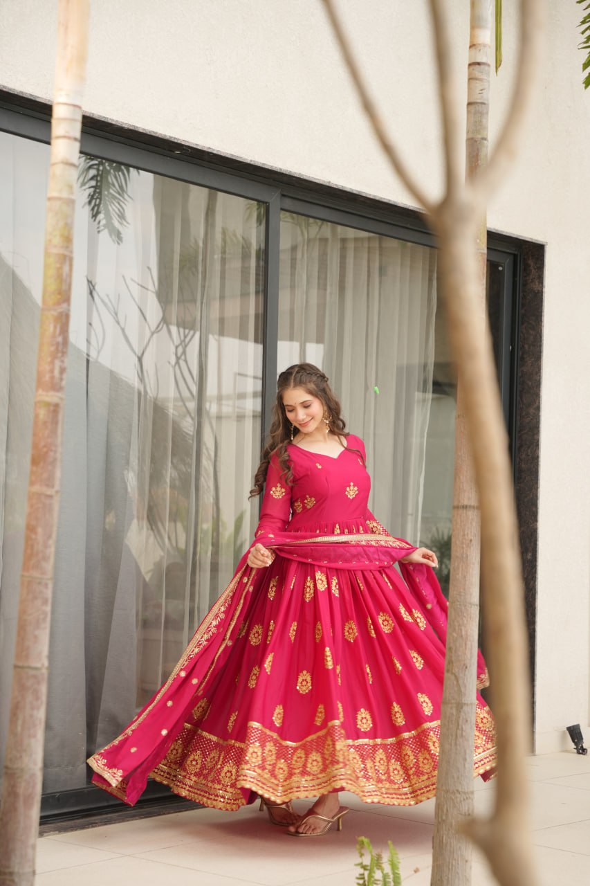 Rudrika Pink Embroidered Gown in soft Star Georgette with intricate zari and sequin work, full-length 56-inch flare gown with matching embroidered dupatta, elegant pan neck design, perfect for weddings and festive occasions