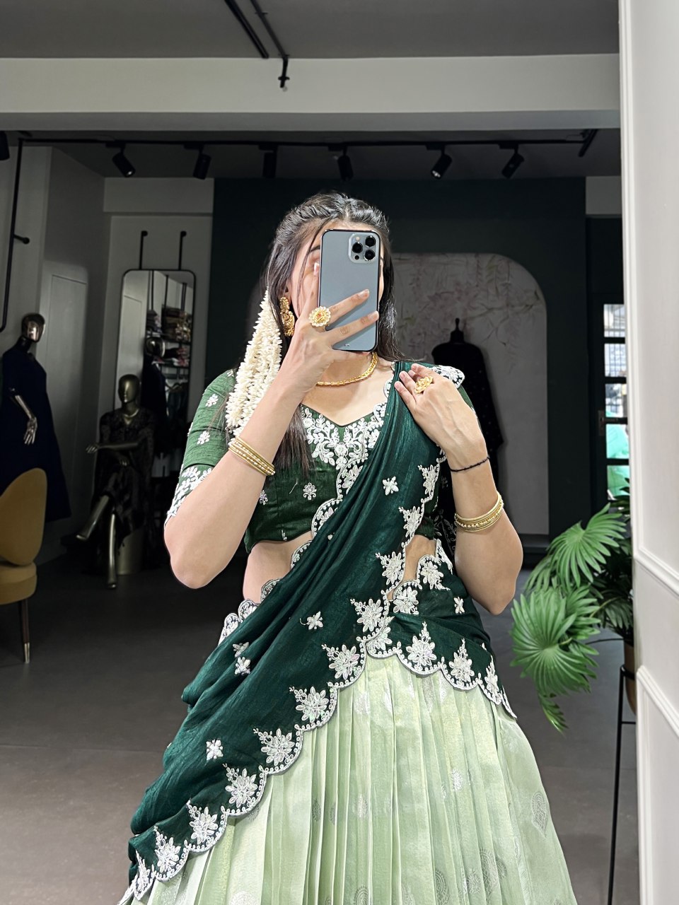 Pista green Zari Kota lehenga with intricate zari weaving work, paired with an embroidered Vichitra silk dupatta – a graceful outfit for festive and wedding occasions