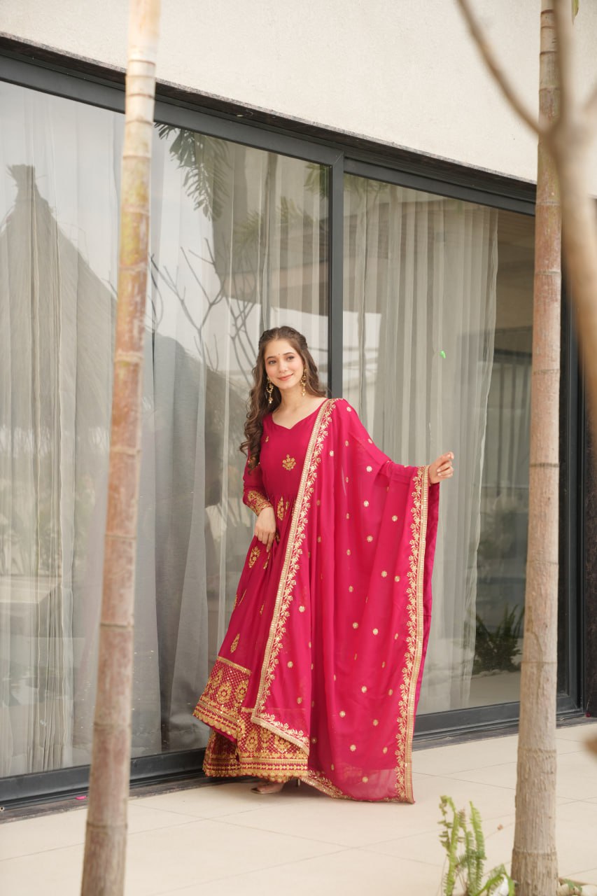 Rudrika Pink Embroidered Gown in soft Star Georgette with intricate zari and sequin work, full-length 56-inch flare gown with matching embroidered dupatta, elegant pan neck design, perfect for weddings and festive occasions