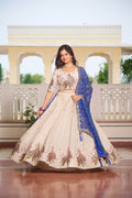 Amla off-white tissue silk lehenga choli with sequins thread work and blue Bandhej dupatta