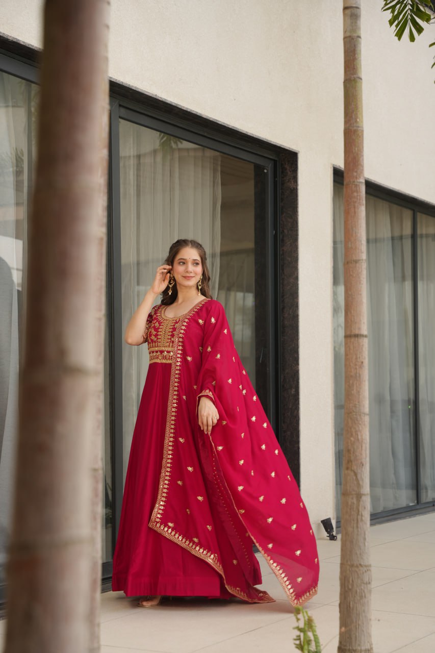 Aadishri Pink Vichitra Silk Gown with multi-sequins and zari embroidery – perfect Indian ethnic wear for weddings, party wear dresses for women, designer gown for women, traditional Indian dress, Indian clothing for women, ethnic wear for girls, gown for wedding function, Indian dress online shopping, full sleeve gown for women, festive wear for ladies.
