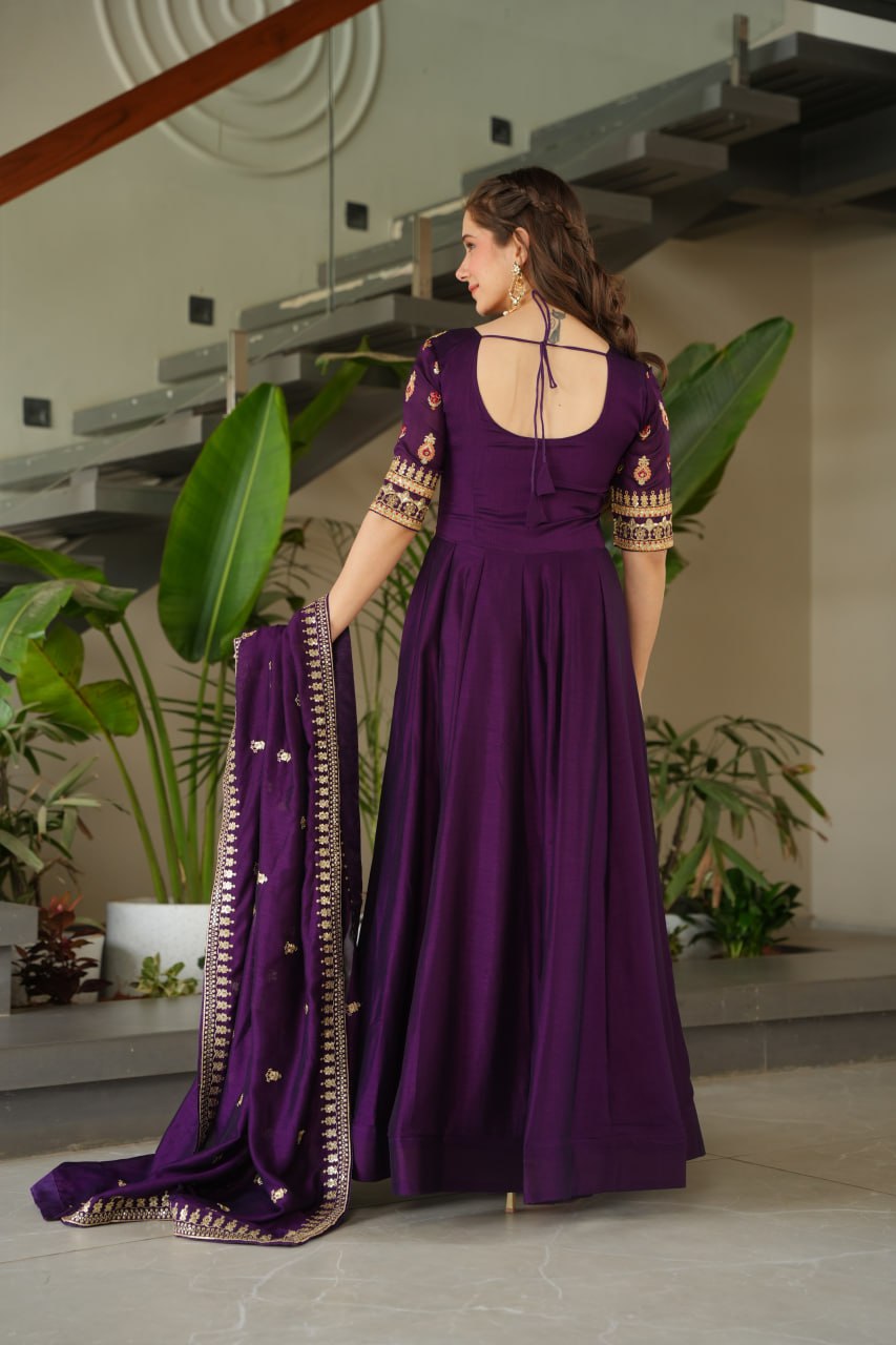Aadishri Purple Vichitra Silk Gown with multi-sequins and zari embroidery – perfect Indian ethnic wear for weddings, party wear dresses for women, designer gown for women, traditional Indian dress, Indian clothing for women, ethnic wear for girls, gown for wedding function, Indian dress online shopping, full sleeve gown for women, festive wear for ladies.
