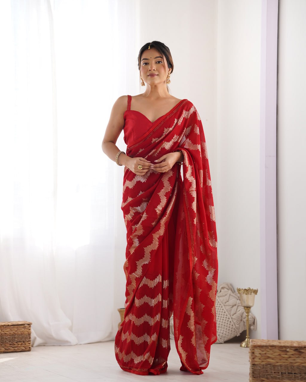 Red georgette saree with sequin & Seroski diamond work, bridal party wear saree with satin blouse, designer ethnic wear by Trinaari for weddings.