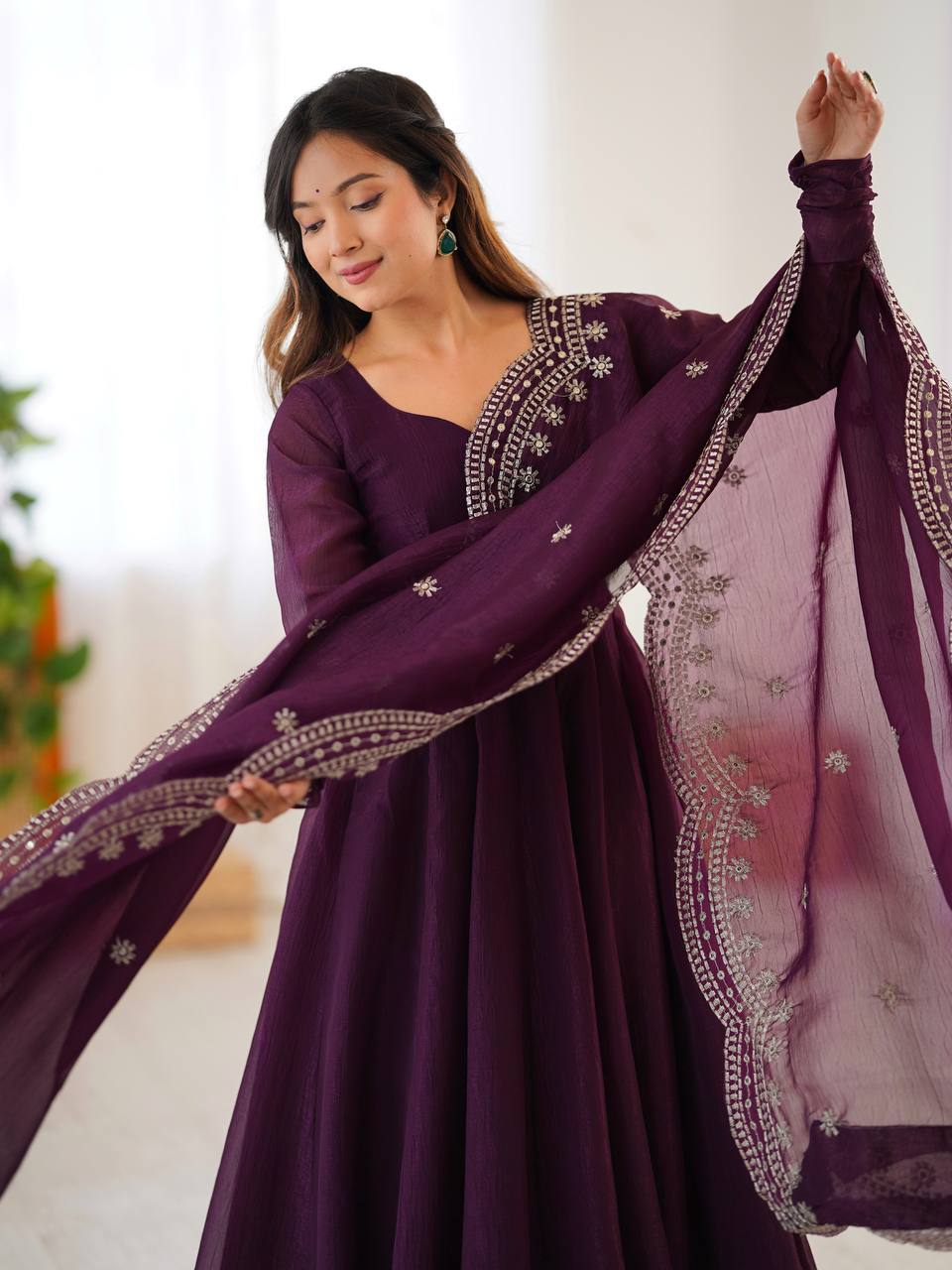 Tiya purple Fandy Silk Anarkali suit with 4.5-meter flair, full sleeves & embroidered dupatta – stitched & ready for weddings, parties & festive wear.