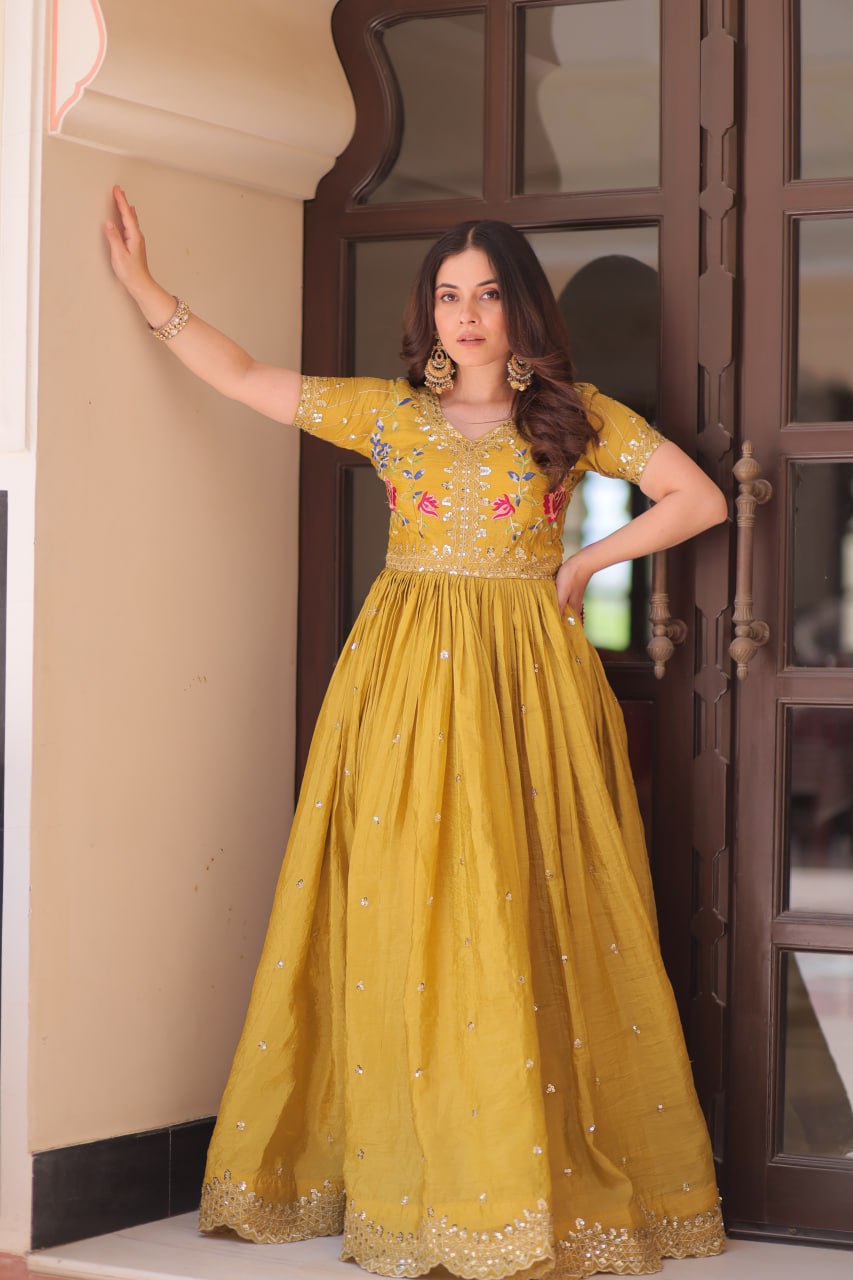 Mustard Yellow Gold Crush gown with zari, sequins, and multi-thread embroidery, featuring V-neck and short sleeves – perfect for weddings and festive occasions