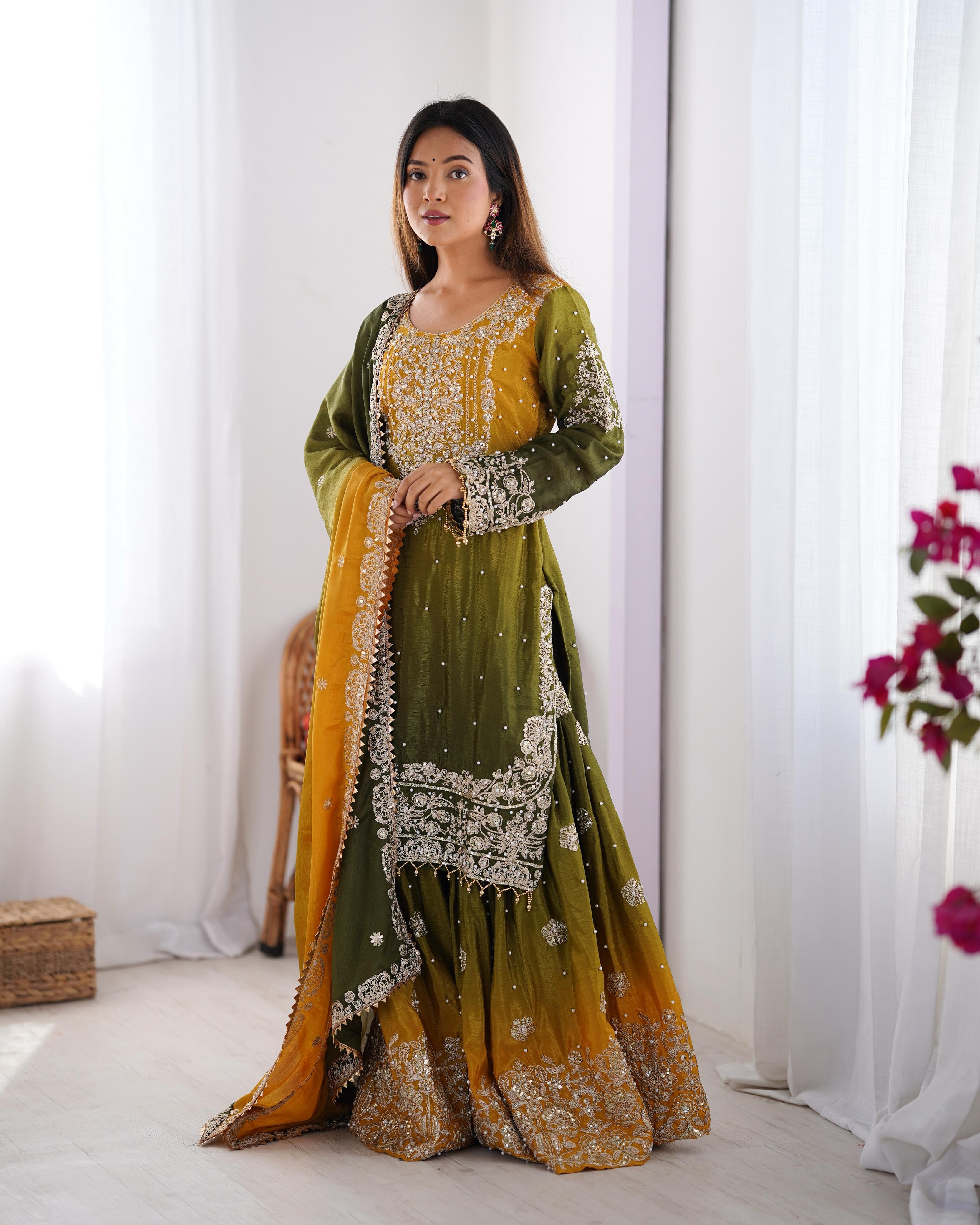 This Manvisha Yellow-Green Embroidered Sharara Suit Set is a luxurious choice for wedding wear, festive outfits, and partywear sharara suits. Crafted from premium Chinon silk, this designer sharara set features intricate cording dori embroidery, sequins work, and rivet moti detailing, making it an ideal pick for Indian wedding outfits. The fully stitched kurta boasts embroidery on both the front and back, complementing the stylish embroidered sharara pants with an elastic waistband for a comfortable fit. Pa