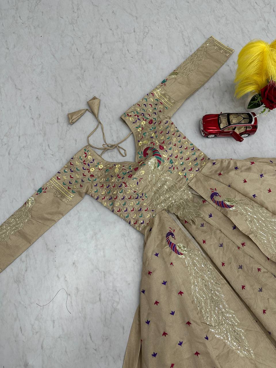 Mani Beige Color Vichitra Silk Crop Top Peacock Design Lehenga with Embroidered Shrug