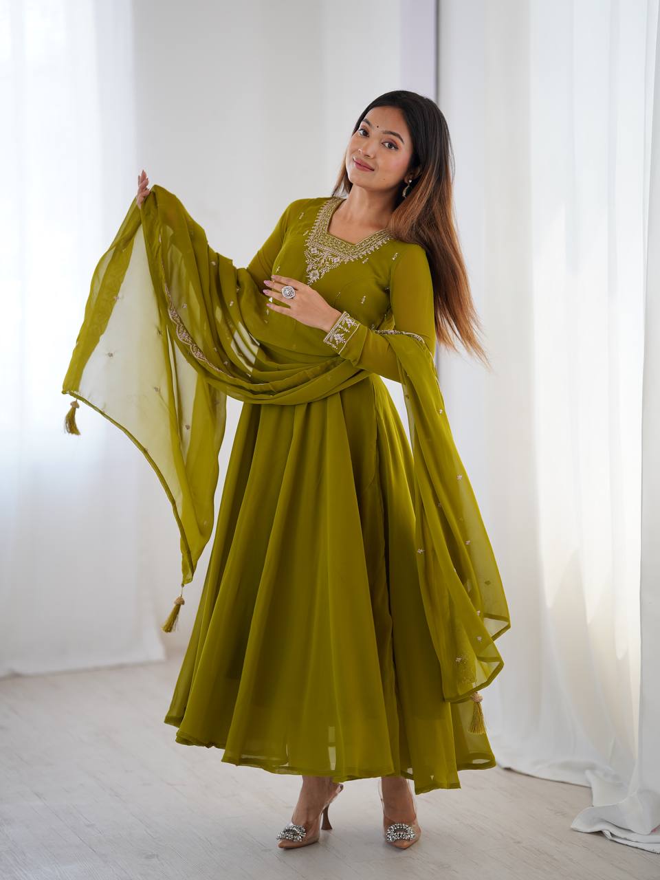 Green Anarkali suit in soft Fox Georgette with 6.5-meter flair, beads & zari embroidery, lace sleeves & dupatta – fully stitched & party-ready.