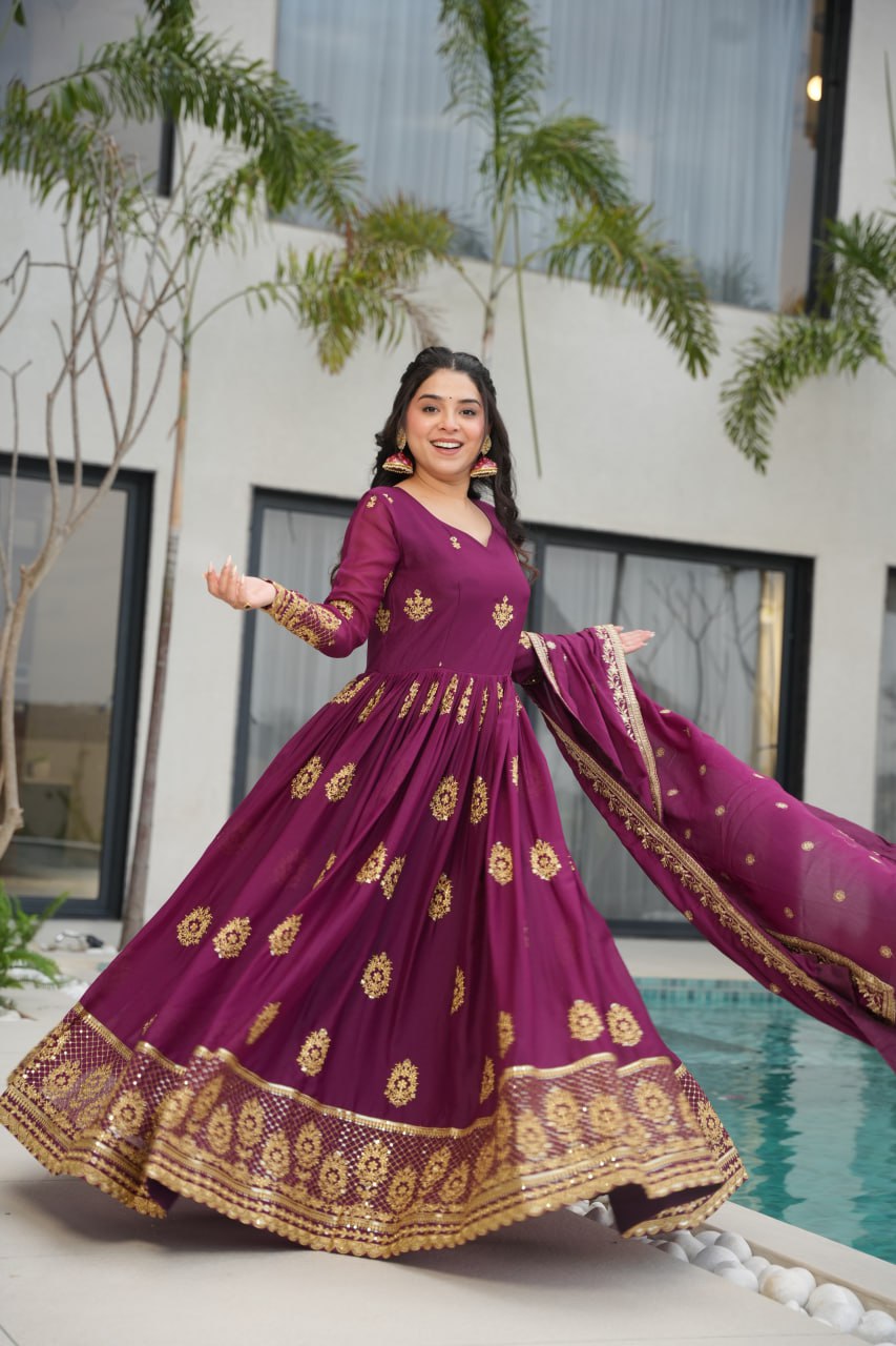 Rudrika Purple Embroidered Gown in soft Star Georgette with intricate zari and sequin work, full-length 56-inch flare gown with matching embroidered dupatta, elegant pan neck design, perfect for weddings and festive occasions