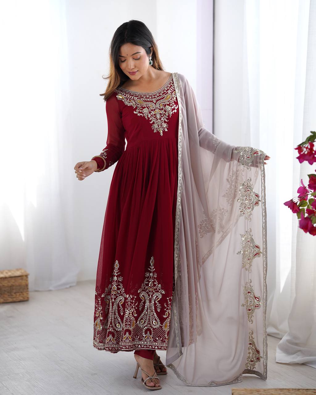 Tejvini Maroon Embroidered Gown Set – heavy georgette gown with multi-thread 5mm sequin embroidery, full sleeves, soft micro cotton lining, paired with matching maroon embroidered dupatta and stitched cotton bottom – ideal for weddings, festive events, and reception looks.