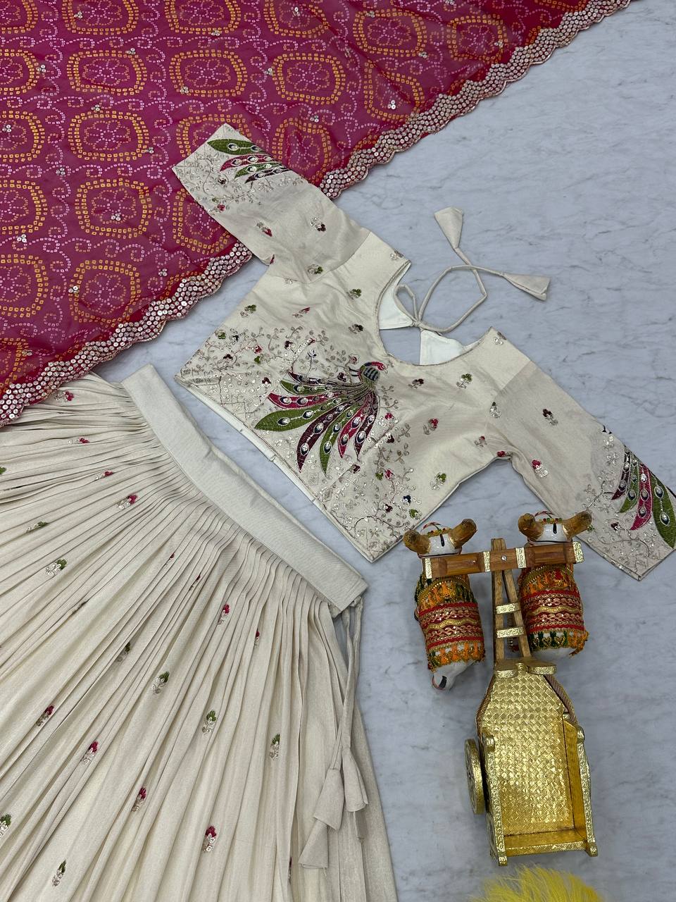 Amla Off-White Tissue Silk Sequins Thread Work Lehenga Choli with Pink Bandhej Dupatta