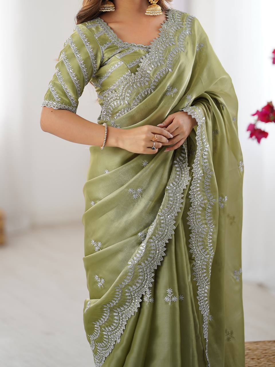 Vikatya pista green Jimmy Choo fabric saree with sequin-thread embroidery & unstitched blouse—perfect for weddings, festivals & party wear.