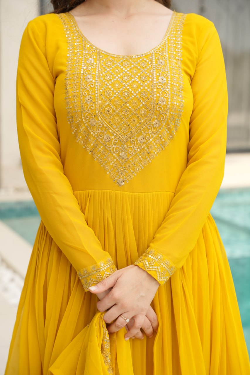 Yellow wedding gown for women with dupatta, embroidered gown design, full sleeve gown, Indian ethnic gown, stitched designer gown by Trinaari.
