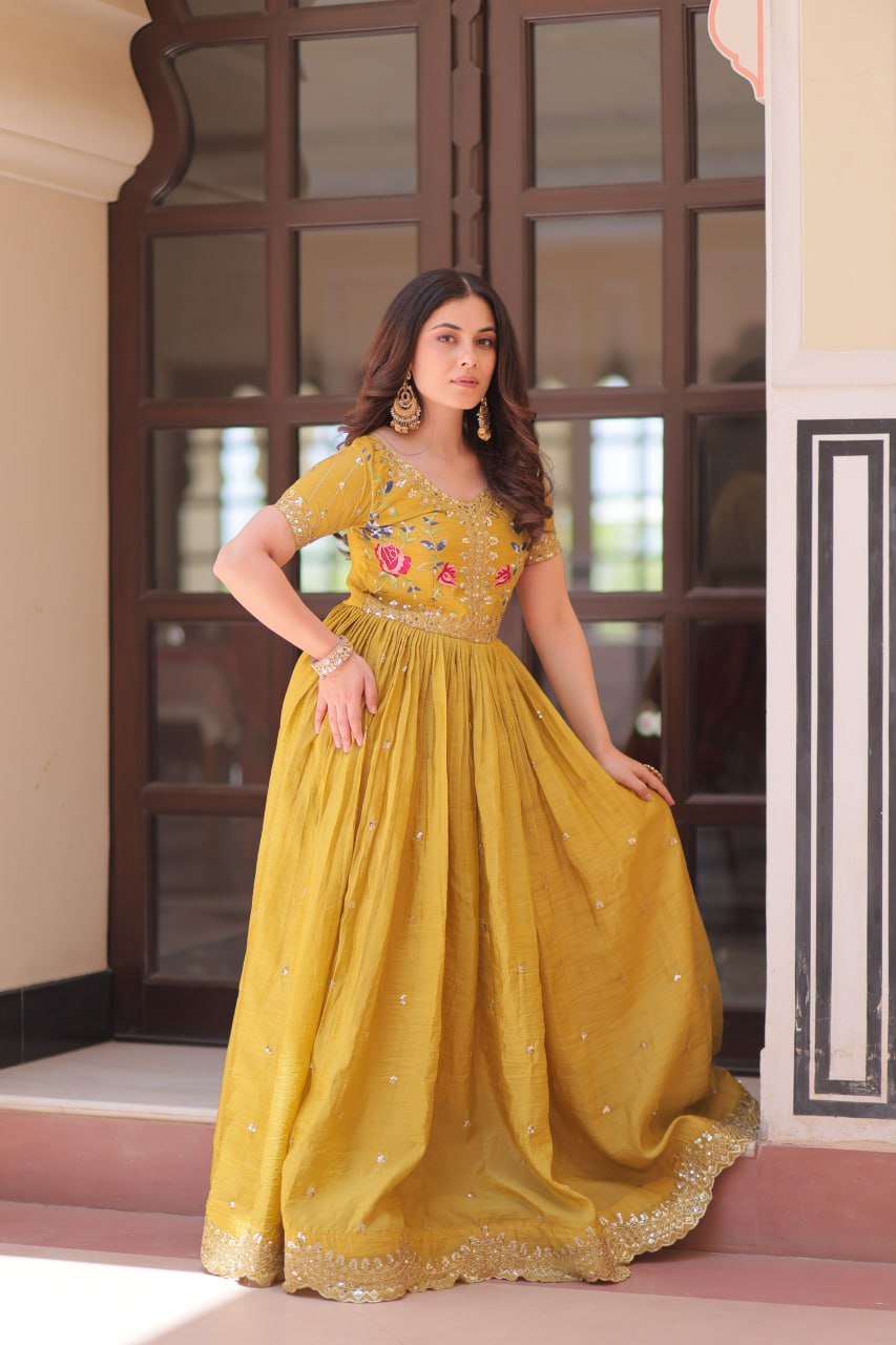 Mustard Yellow Gold Crush gown with zari, sequins, and multi-thread embroidery, featuring V-neck and short sleeves – perfect for weddings and festive occasions