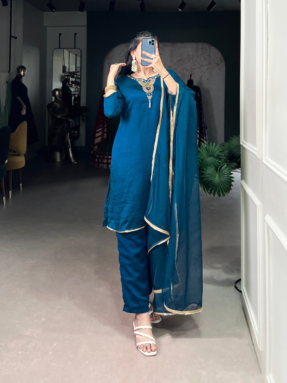 Teal blue Vichitra silk suit set featuring delicate handwork with beads and sequins, paired with an elegant organza dupatta – perfect for festive events and party wear.