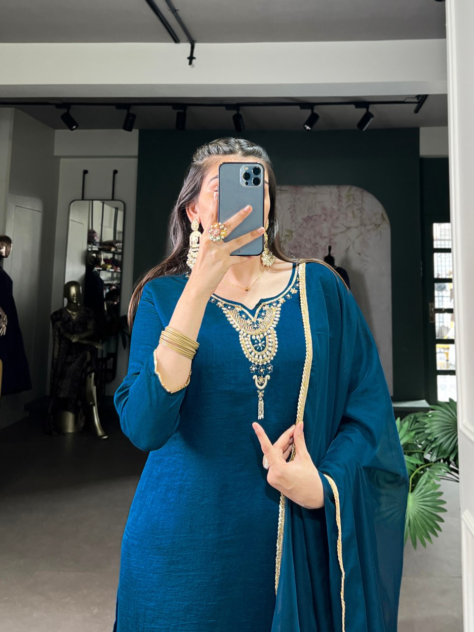 Teal blue Vichitra silk suit set featuring delicate handwork with beads and sequins, paired with an elegant organza dupatta – perfect for festive events and party wear.