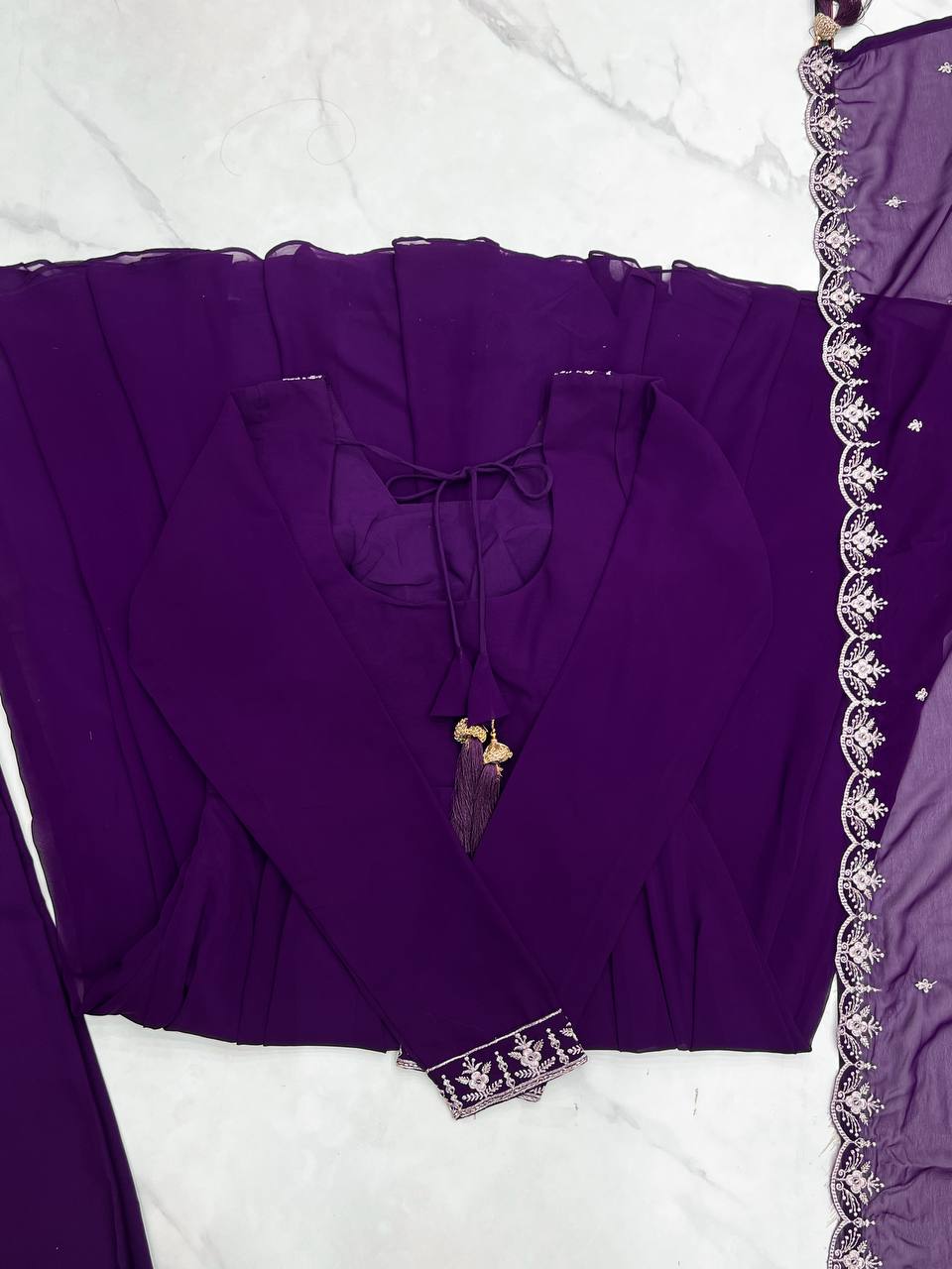 Purple Anarkali suit in soft Fox Georgette with 6.5-meter flair, zari & beads embroidery, lace sleeves & dupatta – stitched & ready-to-wear.