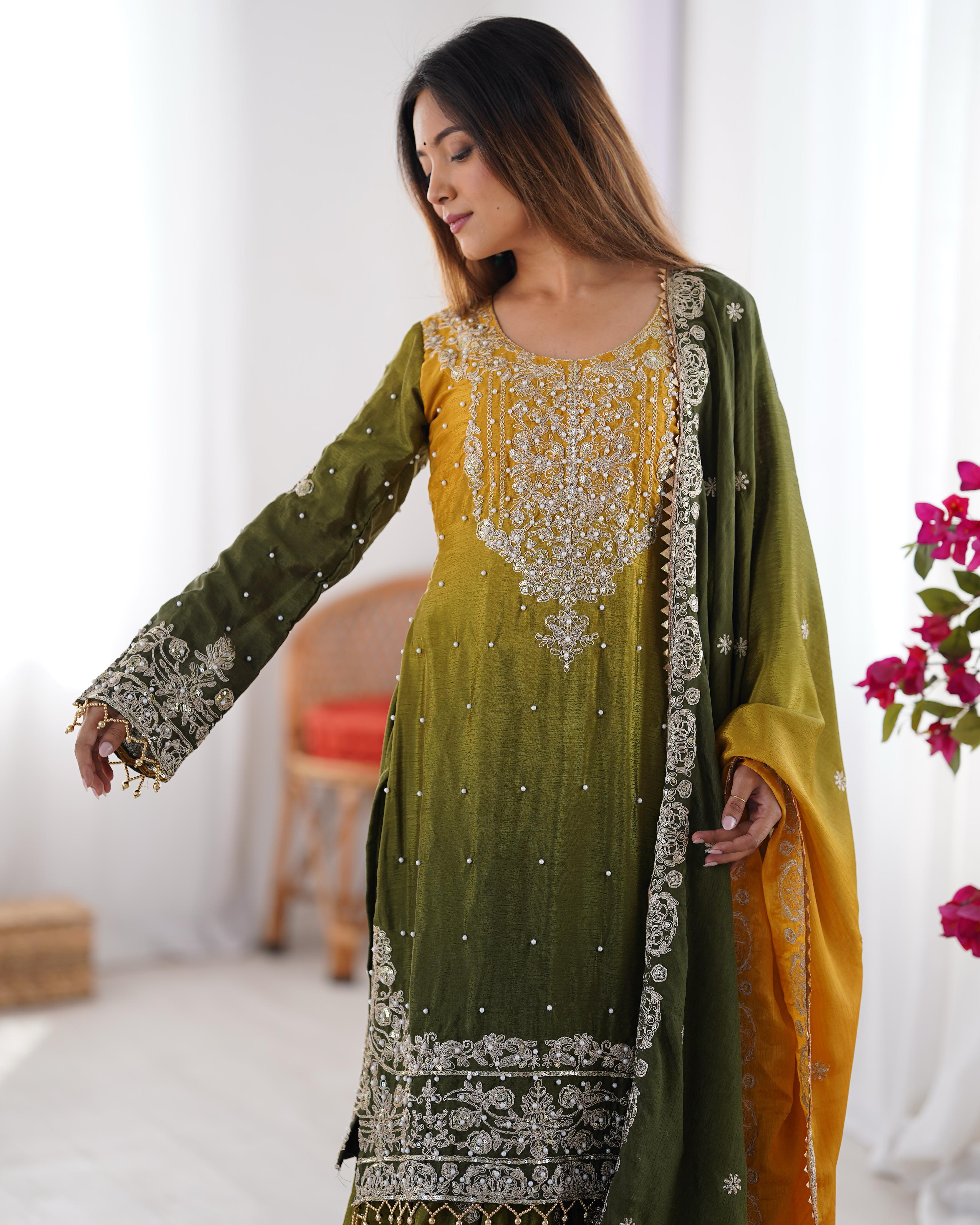 This Manvisha Yellow-Green Embroidered Sharara Suit Set is a luxurious choice for wedding wear, festive outfits, and partywear sharara suits. Crafted from premium Chinon silk, this designer sharara set features intricate cording dori embroidery, sequins work, and rivet moti detailing, making it an ideal pick for Indian wedding outfits. The fully stitched kurta boasts embroidery on both the front and back, complementing the stylish embroidered sharara pants with an elastic waistband for a comfortable fit. Pa