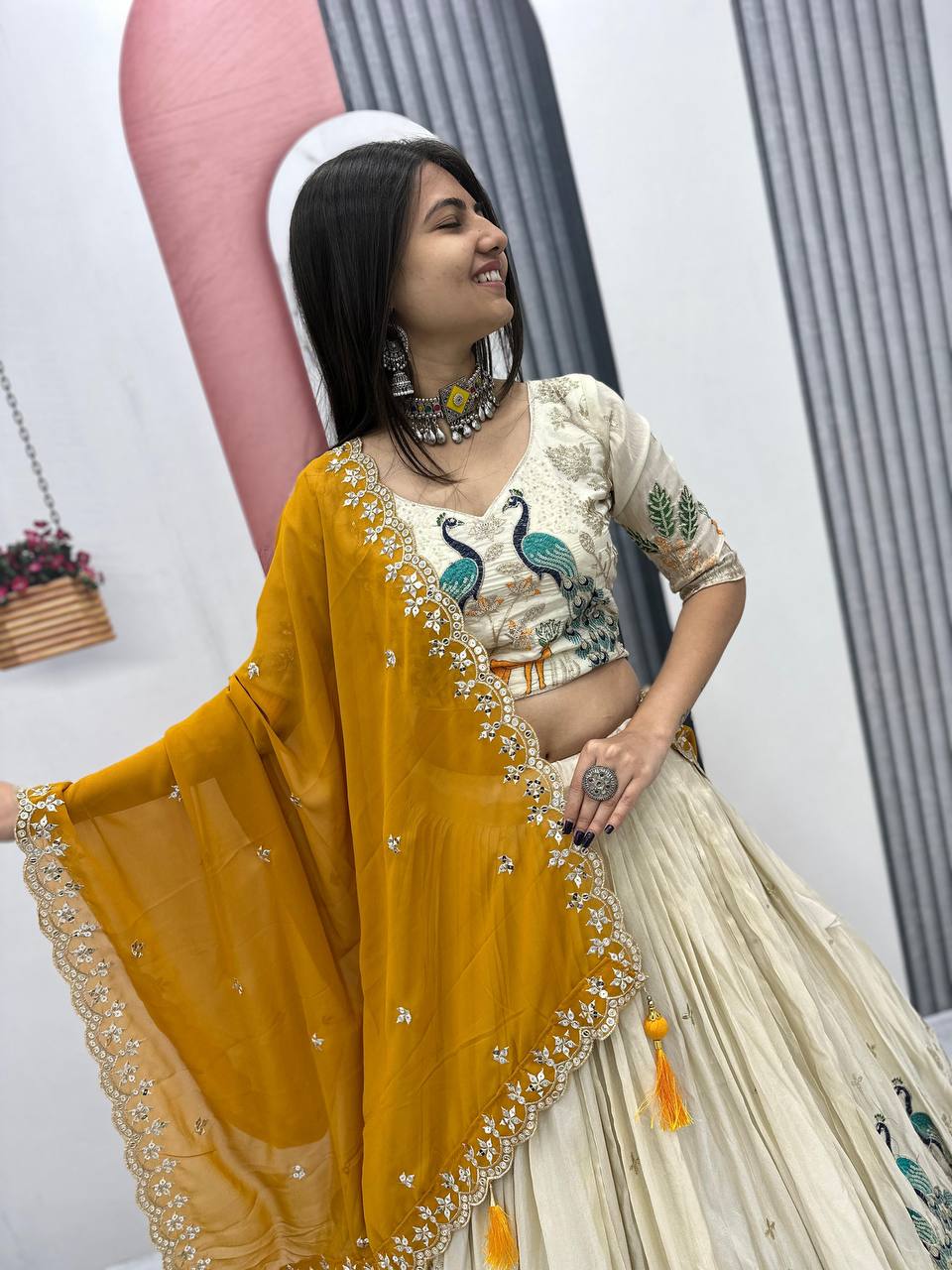 Tarini yellow tissue silk embroidered lehenga choli
