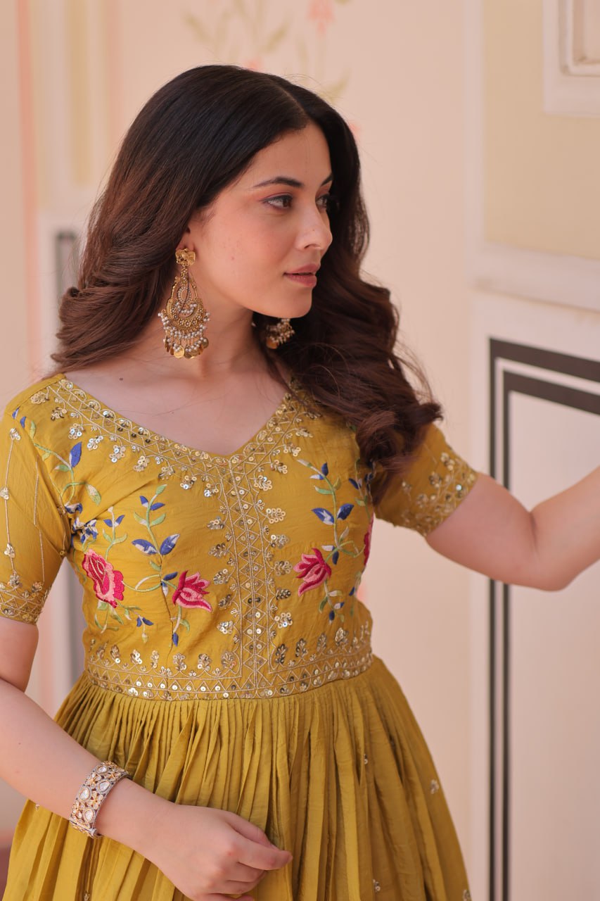 Mustard Yellow Gold Crush gown with zari, sequins, and multi-thread embroidery, featuring V-neck and short sleeves – perfect for weddings and festive occasions