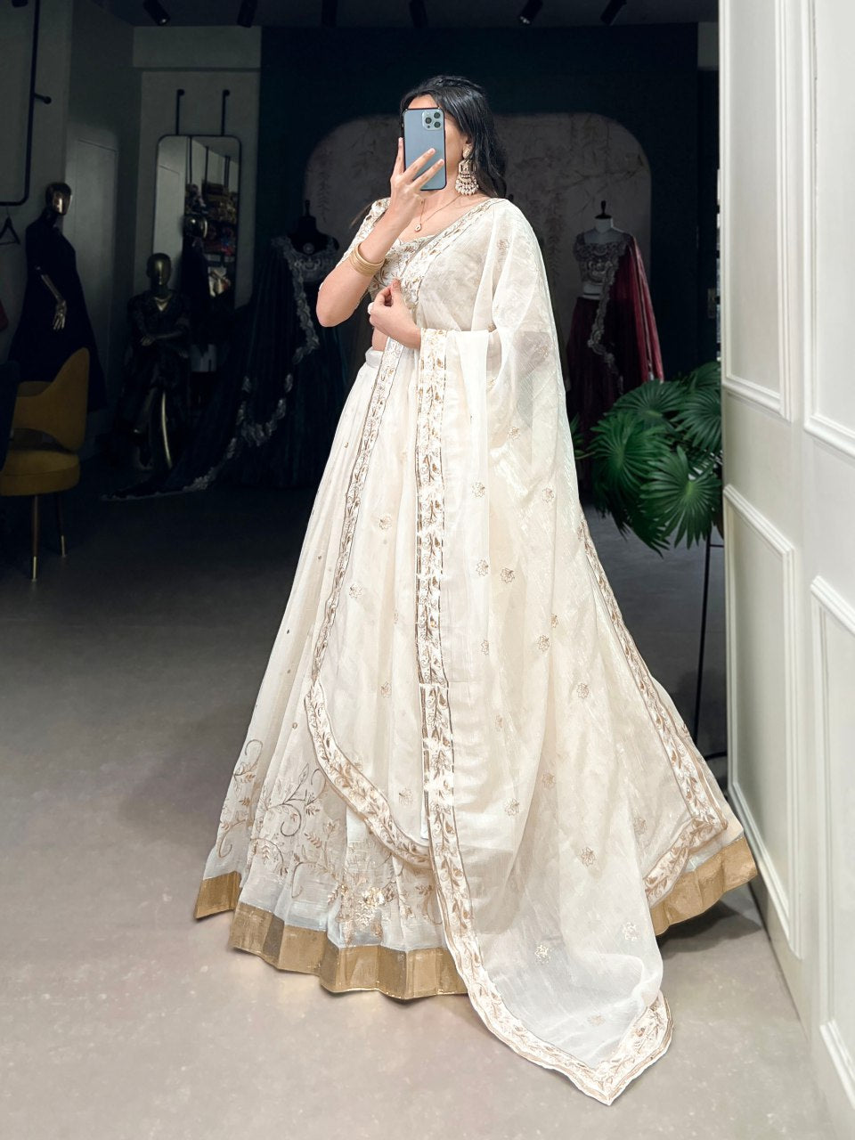 Dharvika Off-White Embroidered Lehenga Choli