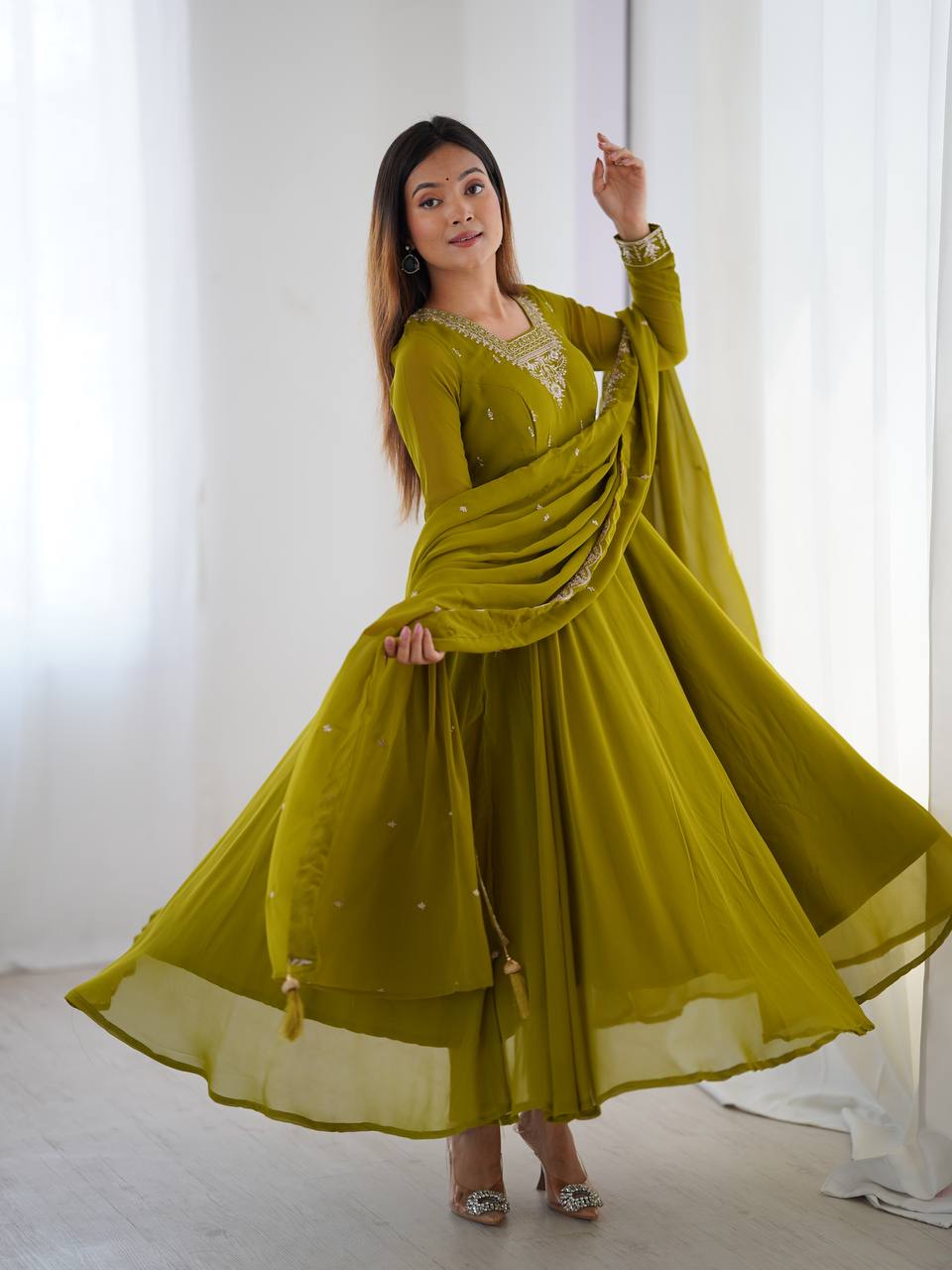Green Anarkali suit in soft Fox Georgette with 6.5-meter flair, beads & zari embroidery, lace sleeves & dupatta – fully stitched & party-ready.