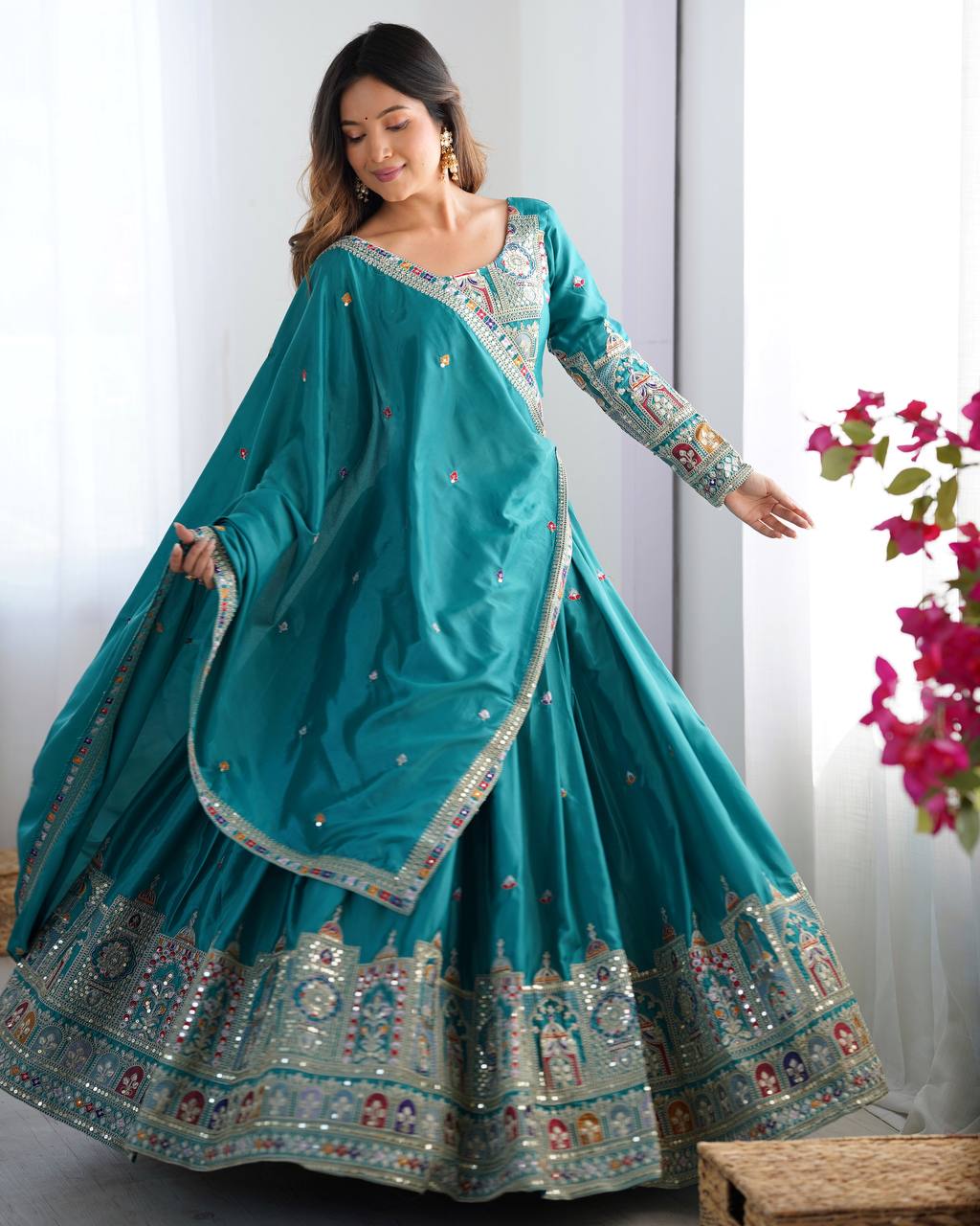 Kavyani Natural Crepe Silk Teal Color Lehenga Choli Set – semi-stitched lehenga with 3-meter flair, cancan and canvas patta, intricately embroidered with coding dori, thread, and sequins; paired with unstitched matching choli and embroidered dupatta with lace border, premium festive and wedding ethnic wear for women by Trinaari.