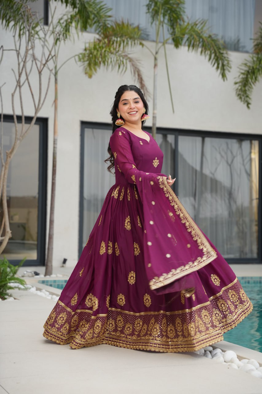 Rudrika Purple Embroidered Gown in soft Star Georgette with intricate zari and sequin work, full-length 56-inch flare gown with matching embroidered dupatta, elegant pan neck design, perfect for weddings and festive occasions
