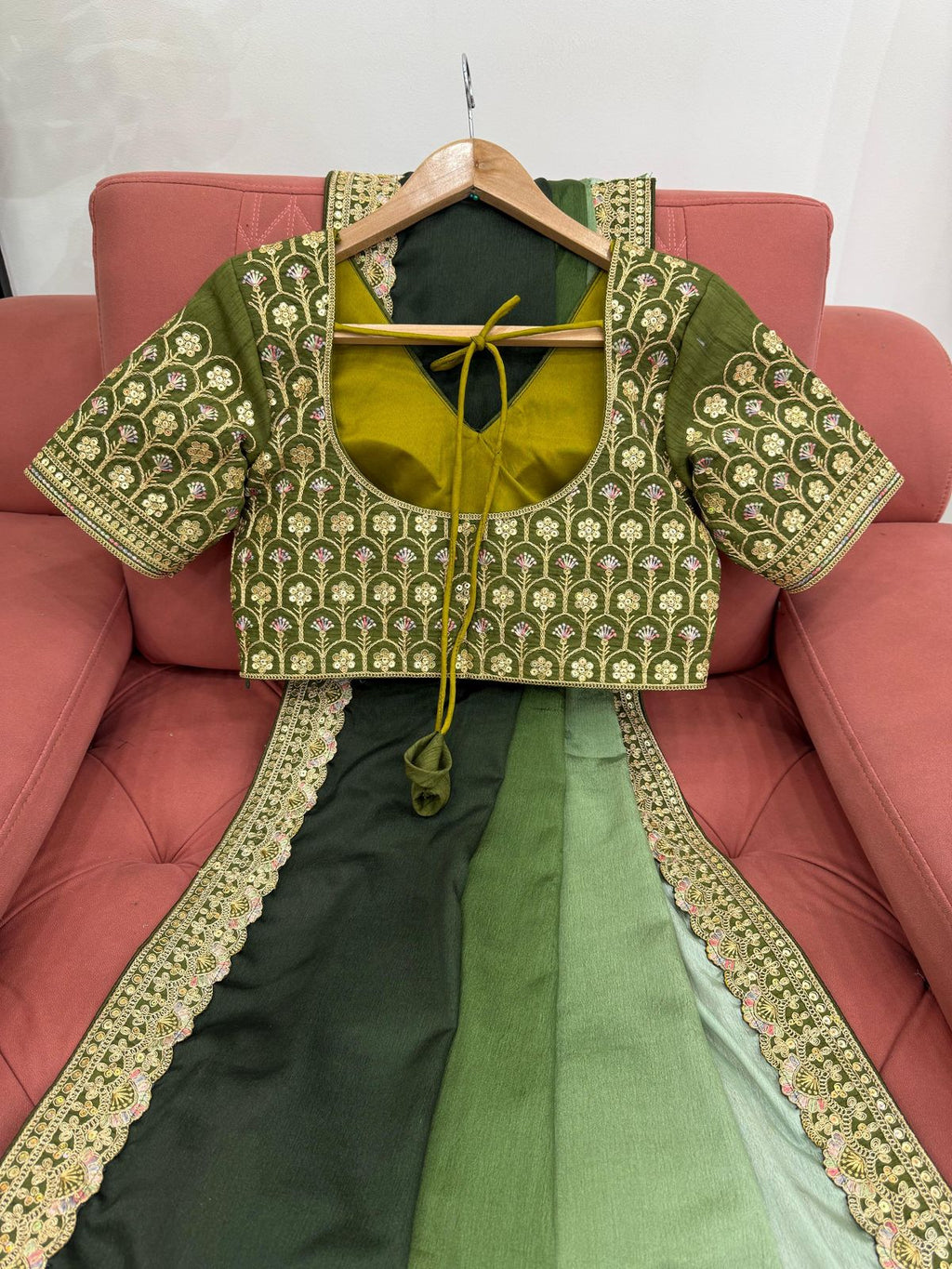 Shanvika pista green pure Chinon silk saree with delicate thread embroidery and sequin lace border, paired with unstitched Mono Benglori embroidered blouse fabric – perfect for weddings, festive celebrations, and party wear 