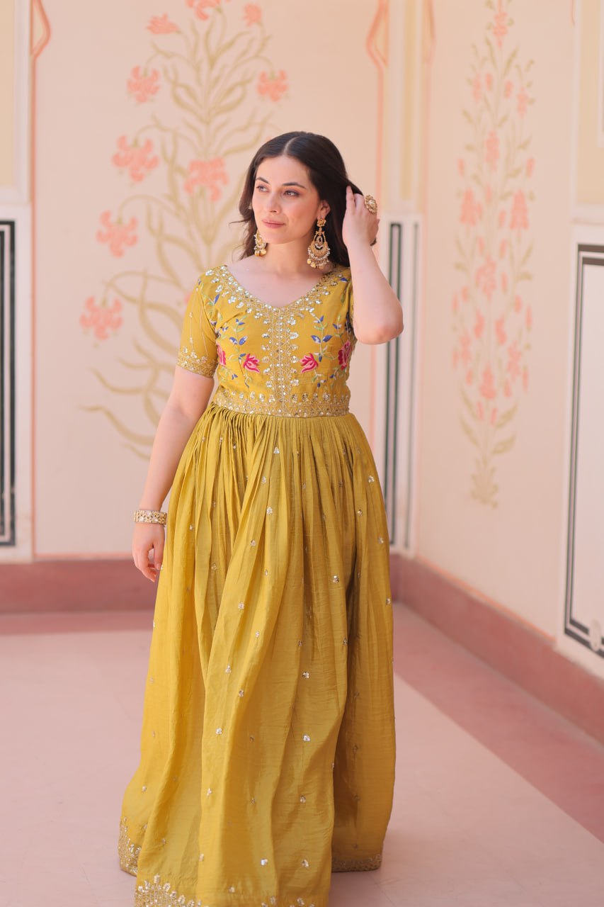 Mustard Yellow Gold Crush gown with zari, sequins, and multi-thread embroidery, featuring V-neck and short sleeves – perfect for weddings and festive occasions