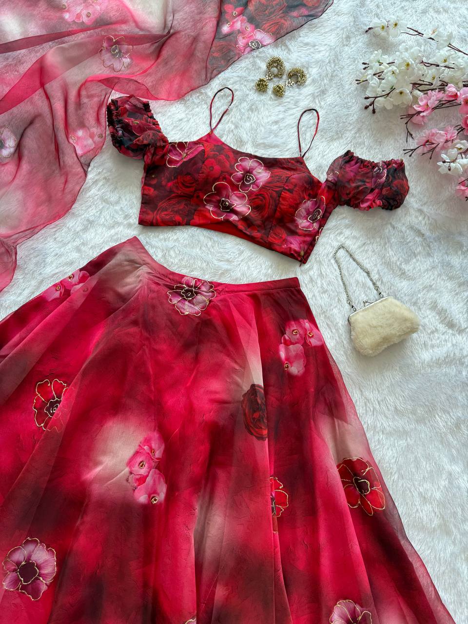 Red pure organza digital print zari work lehenga choli with batwa bag