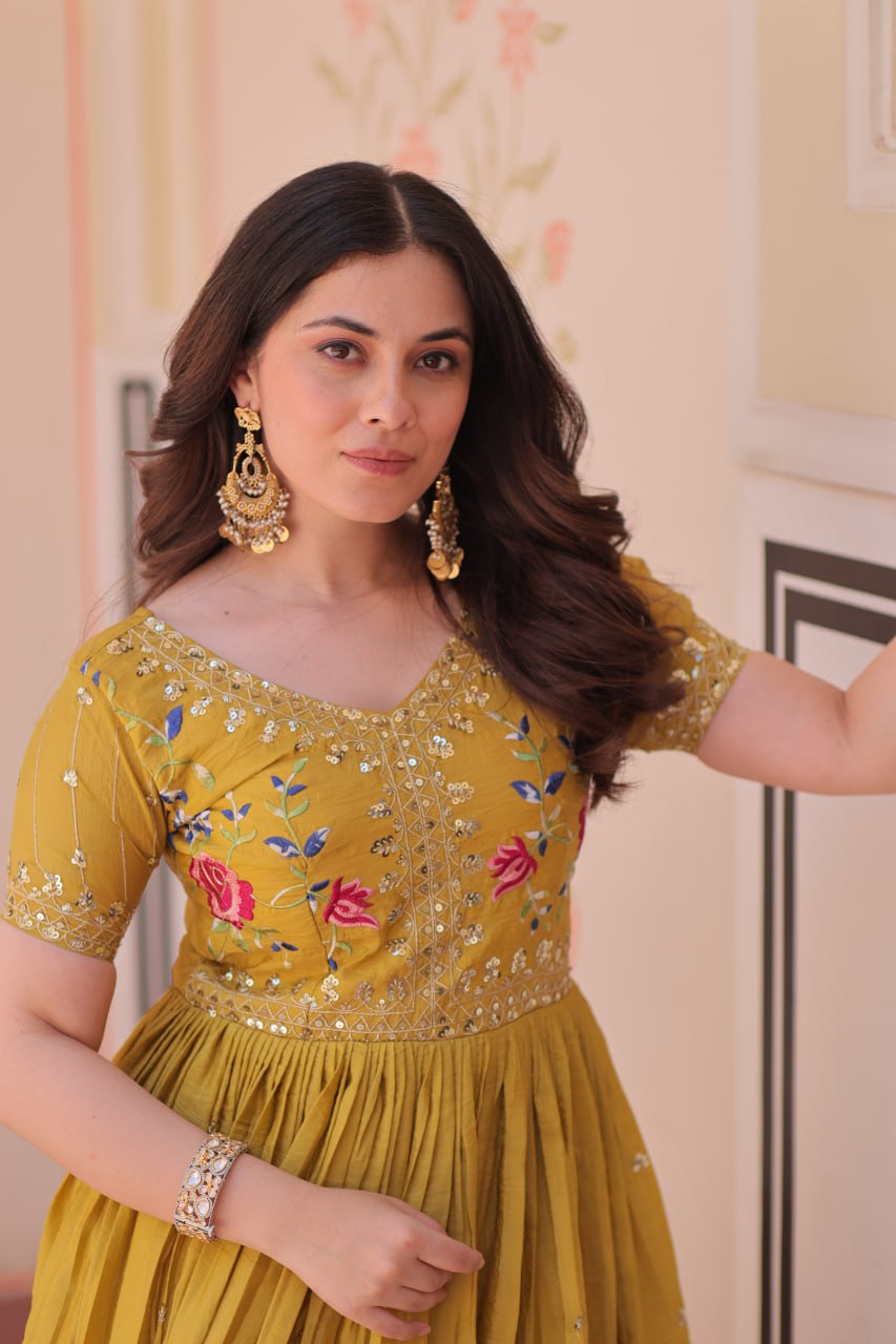 Mustard Yellow Gold Crush gown with zari, sequins, and multi-thread embroidery, featuring V-neck and short sleeves – perfect for weddings and festive occasions