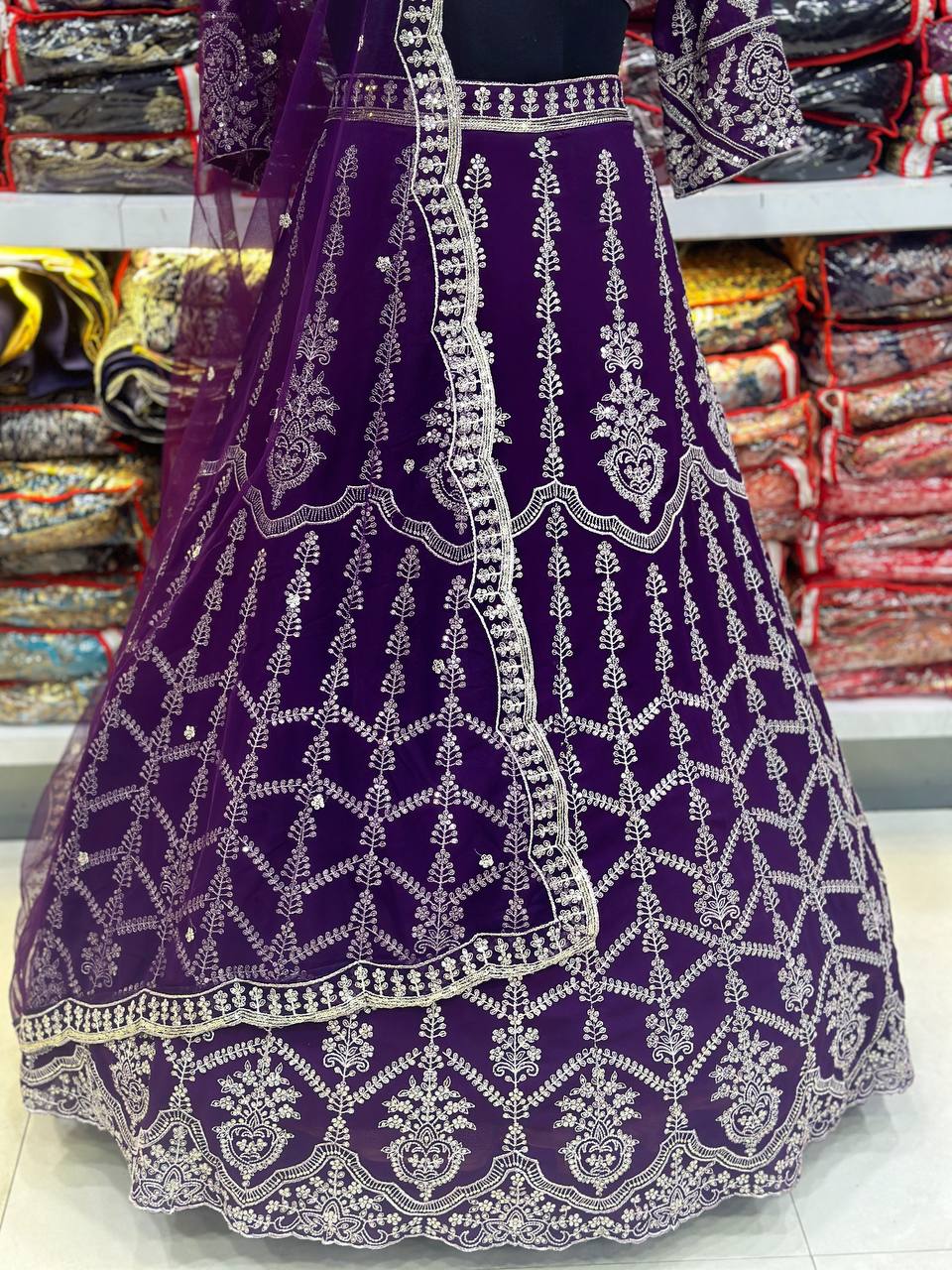 Purple georgette sequins embroidered lehenga choli with net dupatta